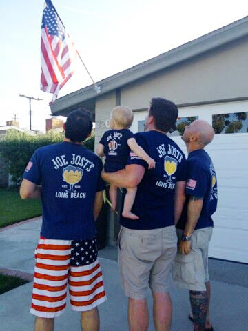 Andy Terpstra holding Owen, with Travis Smith & Alex Morris